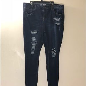 Distressed Patched Mid Rise Skinny Jeans